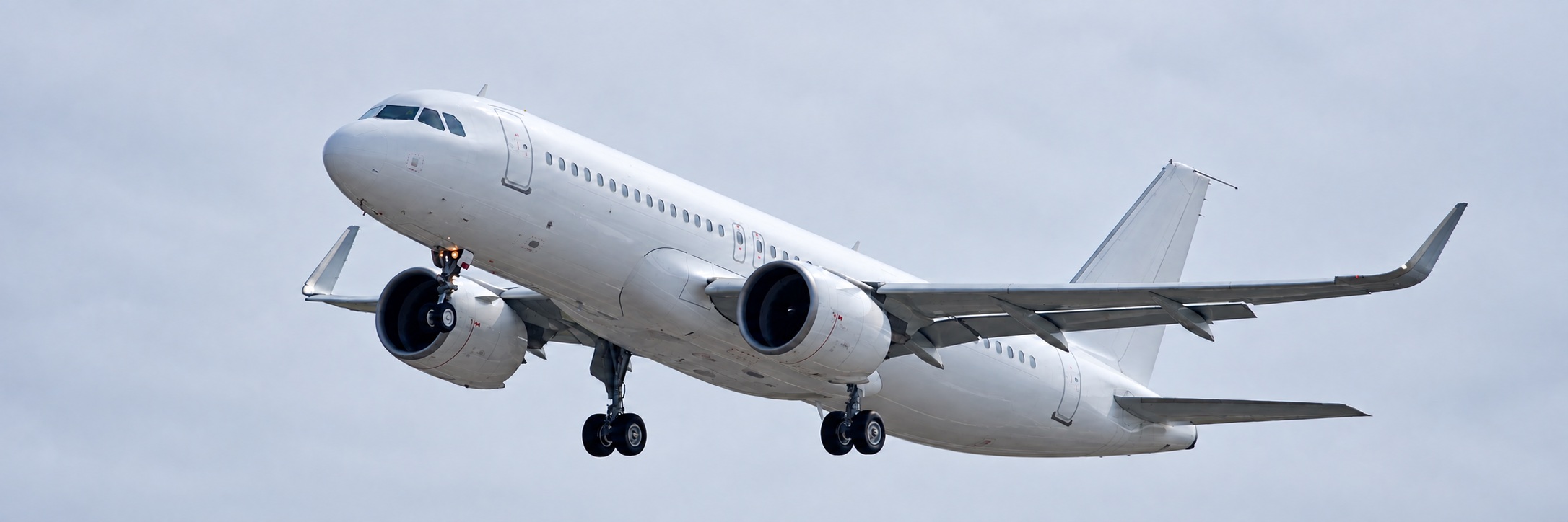 Passenger aircraft taking off in daylight